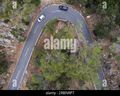 Ciclisti in salita sulla strada lluc, Maiorca, Isole Baleari, Spagna. Foto Stock