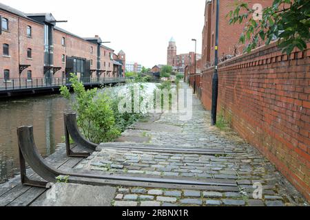 Sentiero di ciottoli e area di carico del carbone presso il Leeds and Liverpool Canal presso il Wigan Pier nella Greater Manchester Foto Stock