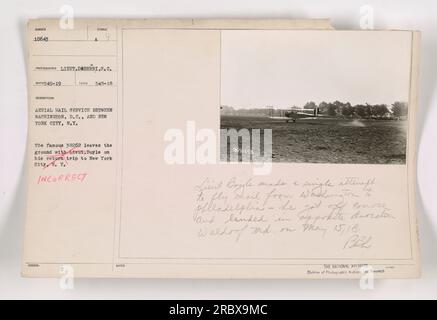 Didascalia: Il tenente Boyle sul famoso aereo 38262 si prepara per il suo viaggio di ritorno da Washington DC a New York durante il primo servizio di posta aerea il 15 maggio 1918. Tuttavia, atterrò erroneamente a Waldorf, Maryland, invece che a Filadelfia, dopo aver lasciato la rotta. Fotografia scattata da Likut.Deborri, fotografo della Divisione Archivi nazionali di Archivi fotografici e ricerca. Foto Stock