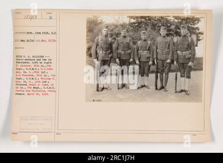 Cinque soldati statunitensi, composti da tre marines e due fanti, posano per una fotografia nel Jardin des Tuileries a Parigi, in Francia. I soldati da sinistra a destra sono F. Dochter, H.T. Johnson, R.M. Stoneham, William H. May e il caporale Cecil R. Laws. La foto è stata scattata il 20 aprile 1918 dalla Corp Keen Polk. Fu successivamente pubblicato, censurato e pubblicato il 23 maggio 1918 dalla Historical Branch of the War Plans Division. Foto Stock