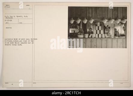 Vista interna di una sala pasticceria durante la prima guerra mondiale, che mostra la cucina, i piatti e alcune delle carni di manzo di mais. I detenuti si lamentano del fatto che la carne di mais sia dura. Questa foto è stata scattata dal SG T. Ray R. Tyrell, S.C. il 13 aprile 1919. È il soggetto numero 47014. Foto Stock