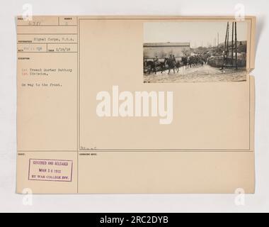 L'immagine raffigura i membri della prima batteria per mortaio trincea della prima Divisione dell'esercito americano durante la prima guerra mondiale. Stanno andando in prima linea. La fotografia è stata scattata il 18 gennaio 1918 e ricevuta l'11 marzo 1918. La fotografia è stata censurata e pubblicata dalla War College Division. Foto Stock