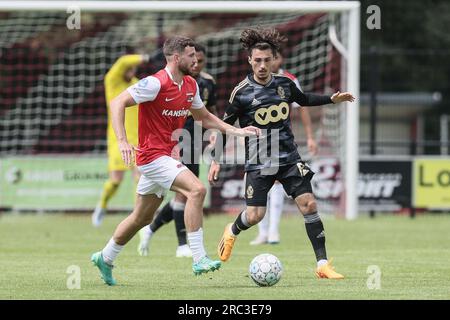 Tubbergen, Paesi Bassi. 12 luglio 2023. Cihan Canak di Standard raffigurato in azione durante una partita di calcio amichevole tra lo Standard belga de Liege e l'olandese AZ Alkmaar, durante il loro training camp estivo, mercoledì 12 luglio 2023 a Tubbergen, per prepararsi alla prossima stagione 2023-2024. BELGA PHOTO BRUNO FAHY Credit: Belga News Agency/Alamy Live News Foto Stock