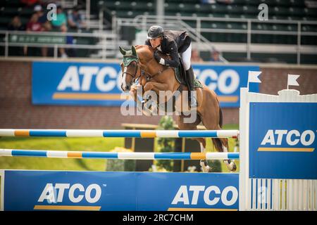 Rupert Carl Winkelmann, tedesco, gareggia nel Rolex North American Grand Prix a Spruce Meadows. Foto Stock