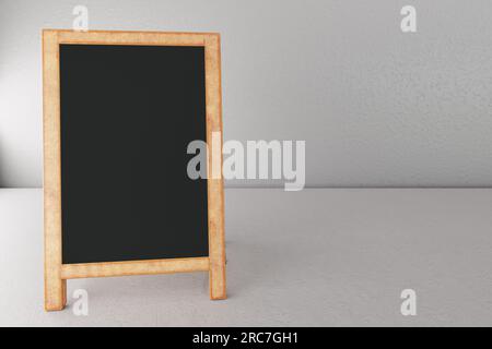 Sfondo modello lavagna vuoto sul pannello della bacheca pubblicitaria posizionato su un pavimento bianco contro una parete di cemento. spazio di copia per la progettazione. rendering 3d. Foto Stock
