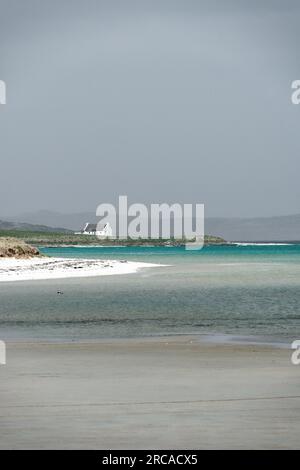 Spiaggia di Traigh Mhor e cottage ad Ardmore, Ardmhor, all'estremità nord di barra, Ebridi esterne, Scozia. Sembra ne Foto Stock