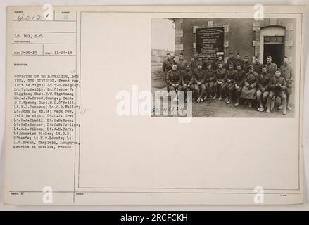 Ufficiali del 2nd Battalion, TH Infantry, 5th Division. Fila anteriore (L-R): Uscita della PDF sx Badgley, tenente T.G. Reilly, Tenente Pierre F. Higgins, Capt. R.M. Wightman, il maggiore J.E. Creed, Capt. R.E. Wysor, capitano M.D. O'Neill, tenente E.J. Donovan, tenente C.P. Paller, tenente John E. White. Fila posteriore (L-R): Tenente D.J. ORN, tenente E.A. Chadil, tenente R.B. Bos8, tenente G.B. Horner, tenente C.W. Corliss, tenente AM Wilson, tenente A.H. Burk, tenente Maurice Ricker, tenente T.D. O'Keefe, tenente H.C. Bounds, tenente A.W. Braun (Cappellano). Ubicazione: Longuyon, Meurthe et Moselle, Francia. Foto Stock