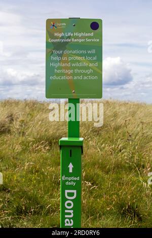 Dunnet Bay, Caithness, Scozia, 7 luglio 2023, Un posto per donazioni per il servizio ranger High Life, Highland Countryside Foto Stock