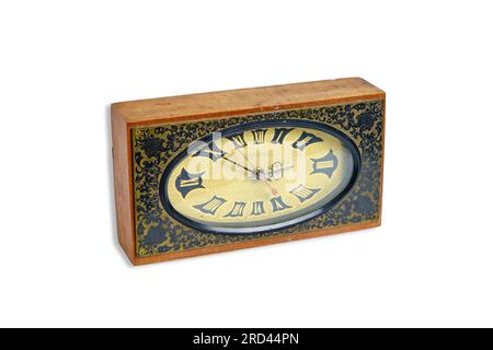 Vecchio orologio da tavolo meccanico retro sfondo bianco Foto Stock
