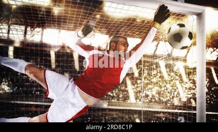 Primo piano di un portiere di calcio che salva la palla a. l'angolo dei pali Foto Stock