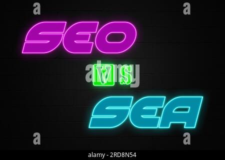 "SEO vs SEA" al neon leggero, progettato in uno stile anni '80. SEO (Search Engine Optimization) e SEA (Search Engine Advertising). Foto Stock
