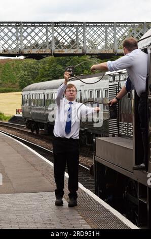 scambio di gettoni sul treno a linea singola weybourne nord norfolk inghilterra Foto Stock