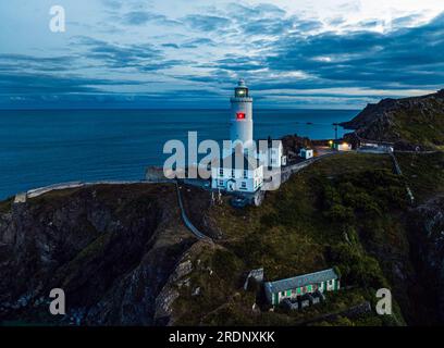 Tramonto sul faro di Start Point da un drone, Trinity House e South West Coast Path, Devon, Inghilterra Foto Stock