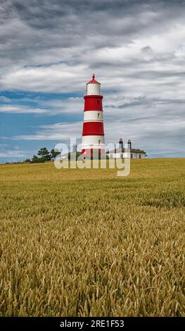Faro di Happisburgh sulla costa nord del Norfolk, Inghilterra, Regno Unito Foto Stock