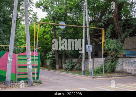 Kazakhstan, Almaty. Yellow Pipes Convey Natural Gas above Ground to Consumers. Stock Photo