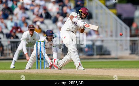 25 luglio 2023; Old Trafford, Manchester, Inghilterra: Division 1 County Championship Cricket, Lancashire contro Northamptonshire Day 1; Emilio Gay del Northamptonshire con Phil Salt del Lancashire dietro i ceppi Foto Stock