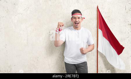 Gli uomini indonesiani celebrano la giornata dell'indipendenza indonesiana il 17 agosto. Giornata dell'indipendenza indonesiana Foto Stock