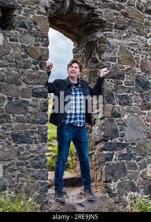 Mike Baillie, The Lonely Together Musician, St Anthony's Chapel, Holyrood Park, Edimburgo, cotland, REGNO UNITO Foto Stock