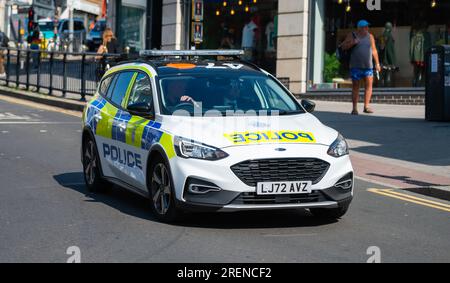 Polizia britannica del Sussex Police in un'auto panda a Brighton, Brighton & Hove, East Sussex, Inghilterra, Regno Unito. Foto Stock