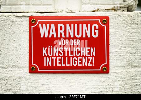 FOTOMONTAGE, Schild mit Aufschrift Warnung vor der Künstlichen Intelligenz Foto Stock