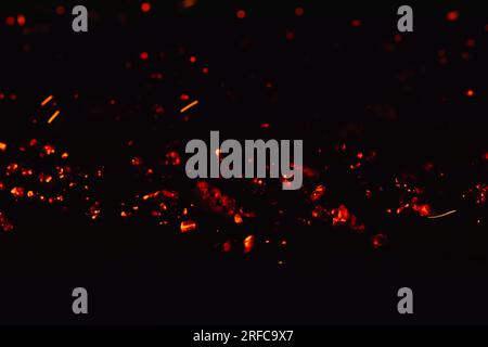 spara scintille rosse di fiamma Foto Stock