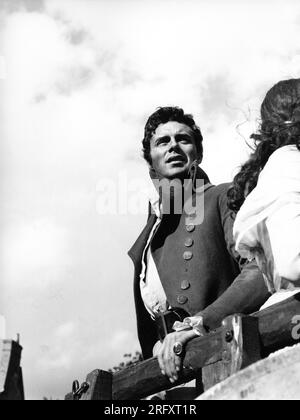 DIRK BOGARDE interpreta Sydney Carton e MARIE VERSINI in Una STORIA DI DUE CITTÀ 1958 regista RALPH THOMAS romanzo Charles Dickens sceneggiatura T.E.B. Clarke costume design Beatrice Dawson musica Richard Addinsell The Rank Organisation Foto Stock