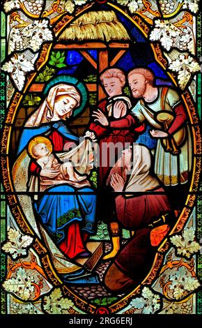 The Nativity, Birth of Jesus, vetrata, di Ward & Hughes, 1869, Stanhoe Church, Norfolk, Inghilterra Foto Stock