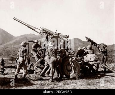 II Guerra Mondiale WW2 - British pistola di artiglieria in azione Foto Stock