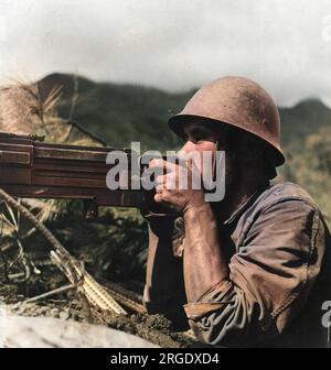 Un mitragliatore giapponese in azione durante la seconda guerra sino-giapponese del 1937-45 Foto Stock