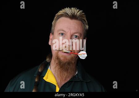 Australian freccette player Simon Whitlock Foto Stock