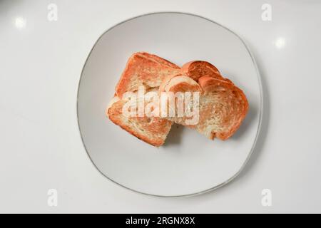 Kaya toast Butter. Colazione tradizionale orientale e vintage kopitiam. Popolare in Malesia e Singapore. Foto Stock