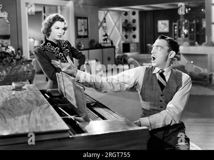 Joan Bennett, Mischa Auer, sul set del film, "letti gemelli", United Artists, 1942 Foto Stock