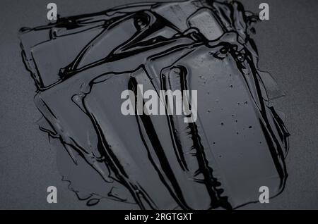 Goccia di gel su sfondo nero Foto Stock