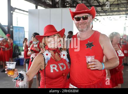 New Orleans, USA. 12 agosto 2023. I partecipanti all'evento partecipano alle attività Red Dress Run presso il Mandeville Shed di New Orleans, Louisiana, sabato 12 agosto 2023. (Foto di Peter G. Forest/Sipa USA) credito: SIPA USA/Alamy Live News Foto Stock