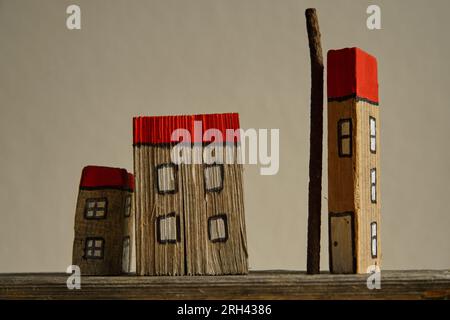 Haussiedlung mit Holzmodellen Foto Stock