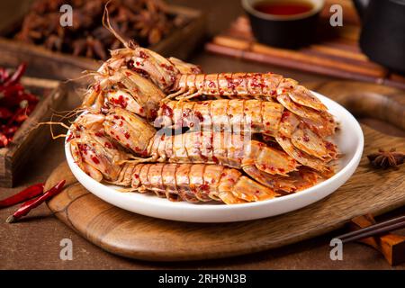 Gamberi marinati Mantis in salsa piccante Foto Stock