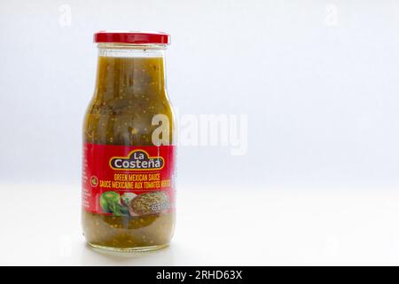 Calgary, Alberta, Canada. Aug 1, 2023. A bottle of green Mexican sauce, brand: La Costeña, a popular brand from Mexico. Stock Photo