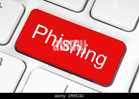 Tasto rosso con parola phishing sulla tastiera primo piano, concetto tecnologico Foto Stock