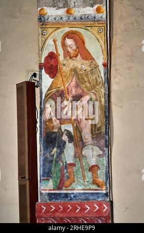 S. Rocco e committente - affresco - pittore bergamasco del XVI secolo - Clusone (BG), Oratorio di San Defendente Foto Stock