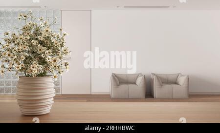 Tavolo o mensola in legno con vaso in ceramica con margherite, fiori selvatici, sala d'attesa con parete in mattoni di vetro in stile minimale, moderno Foto Stock