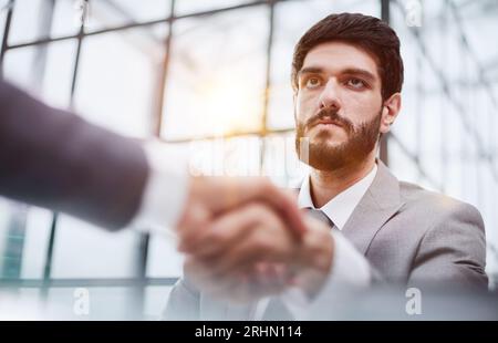 Questa fusione vedrà la crescita potenziale della nostra attività Foto Stock