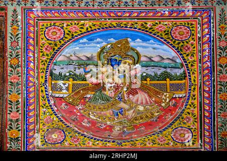 India, Rajasthan, regione di Shekhawati, villaggio di Mandawa, Jhunjhunwala Haveli, sala d'oro, pittura che rappresenta la danza di Krishna con i Gopis Foto Stock