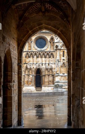 Lincoln Cathedral seen through Exchequer Gate, Lincoln, Lincolnshire, England, UK Stock Photo