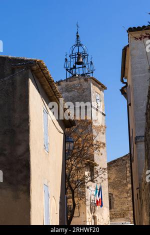 La torre dell'orologio del XVI secolo a Ménerbes, Vaucluse, Provenza, Francia Foto Stock