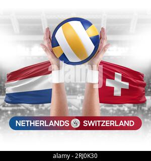 Concetto di gara di pallavolo e pallavolo per squadre nazionali nei Paesi Bassi contro Svizzera. Foto Stock