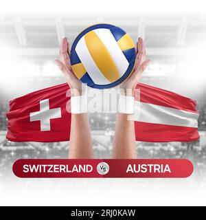 Concetto di gara di pallavolo e pallavolo per squadre nazionali Svizzera-Austria. Foto Stock