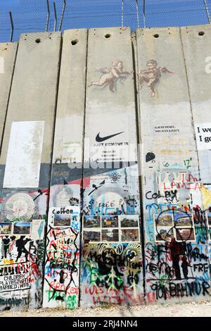 Murales sulla barriera di sicurezza israeliana a Betlemme, Palestina. Foto Stock