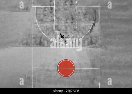 Gioco di basket visto dall'alto con la bandiera giapponese utilizzata come ispirazione Foto Stock