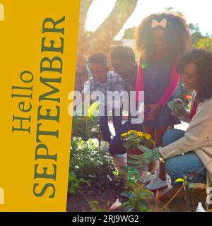 Composito di testo "ciao settembre" su coppia birazziale con giardinaggio bambini Foto Stock