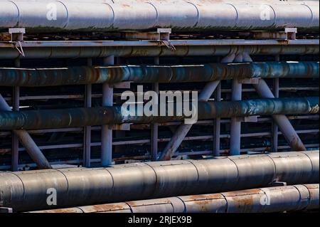 Old rusty pipes and pipelines in industrial area in Rožnov pod Radhoštěm. Stock Photo